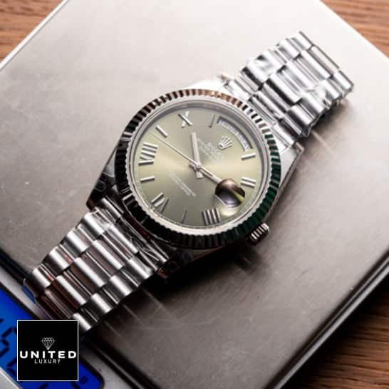 Rolex Day-Date 228239-0033 "Green Dial" Ultra Fine Replica Rolex Olive Green Replica5 Rolex Day-Date 228239-0033 Stainless Steel Replica On the table