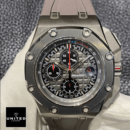 Audemars Piguet Royal Oak Offshore 26568IM.OO.A004CA.01 "Michael Schumacher" Premium Replica 1:1 audemars piguet royal oak offshore michael schumache titanium Audemars Piguet Grey Dial Carbon Bezel Replica front view on the hand