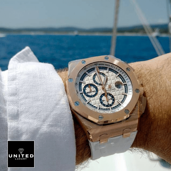 Audemars Piguet Royal Oak Offshore 26408OR.OO.A010CA.01 "Byblos" Near Original Replica audemarspiguet royaloakoffshore 26408OR.OO .A010CA.01 replica hand Audemars Piguet Gold Case White Dial Rubber White Bracelet Replica sea background