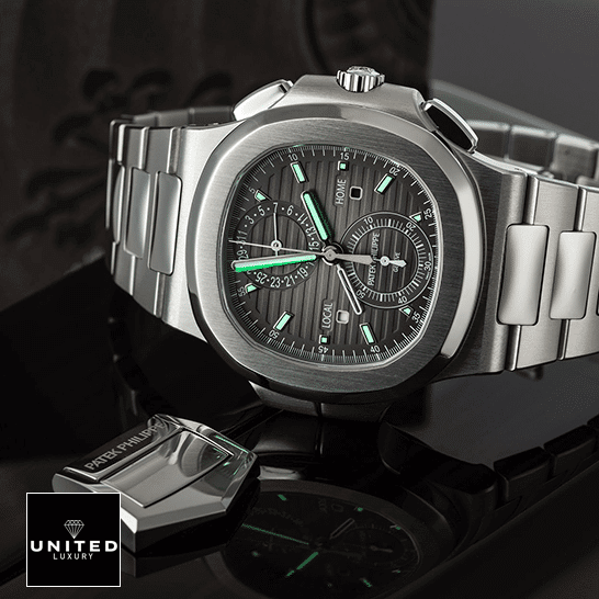 Patek Philippe Nautilus Travel Time Chronograph 5990/1A-001 First-Class Clone patek philippe nautilus 59901A 001 replica tiltedleft Patek Philippe Geneve Black Dial Steel Case Replica dial phosphor